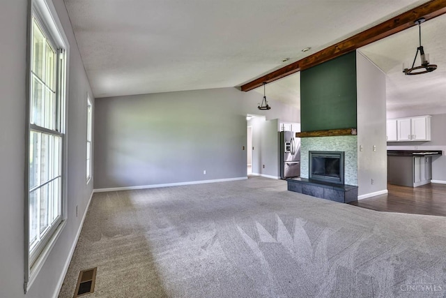6154 Taylor Pike, Wayne Twp, OH 45107 - unfurnished living room with dark carpet and a fireplace