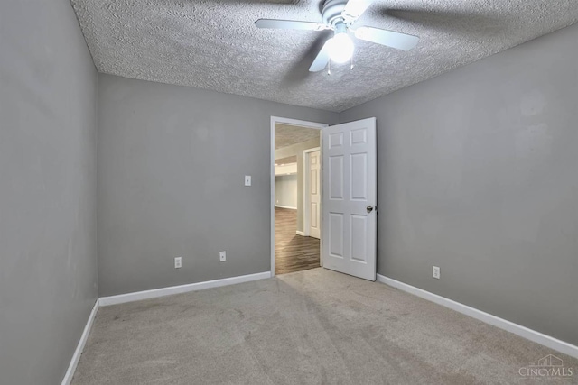6154 Taylor Pike, Wayne Twp, OH 45107 - unfurnished bedroom with a textured ceiling, carpet, and ceiling fan
