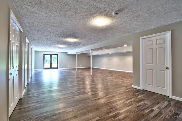 6154 Taylor Pike, Wayne Twp, OH 45107 - spare room featuring wood finished floors, a textured ceiling, a smoke detector, and french doors