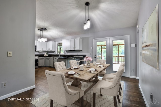6154 Taylor Pike, Wayne Twp, OH 45107 - dining space with dark wood-type flooring, a textured ceiling, and a chandelier