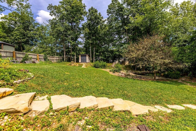 1050 Holz Ave, Anderson Twp, OH 45230 - view of yard with a storage unit and view of scattered trees