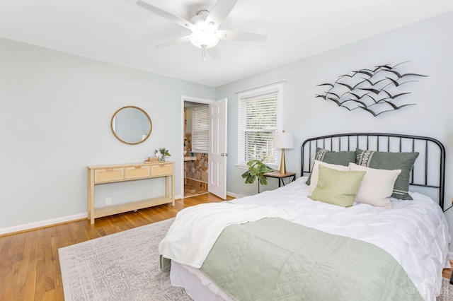 1050 Holz Ave, Anderson Twp, OH 45230 - bedroom with wood finished floors and a ceiling fan