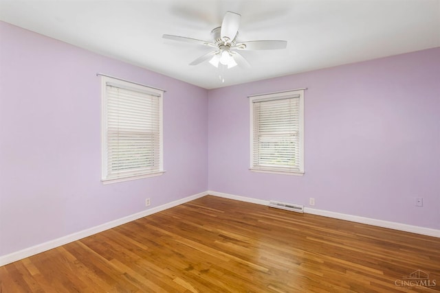 1050 Holz Ave, Anderson Twp, OH 45230 - spare room featuring wood finished floors and a ceiling fan