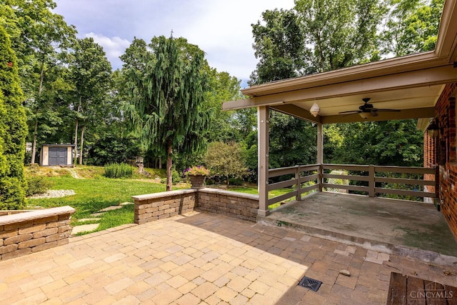 1050 Holz Ave, Anderson Twp, OH 45230 - view of patio / terrace featuring a ceiling fan and a storage unit