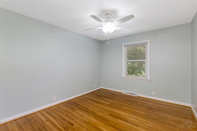 1050 Holz Ave, Anderson Twp, OH 45230 - spare room with wood finished floors and a ceiling fan