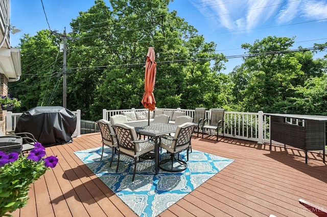 4961 Troubador Ct, Delhi Twp, OH 45238 - deck with outdoor dining area, a grill, and an outdoor hangout area