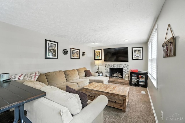 4961 Troubador Ct, Delhi Twp, OH 45238 - carpeted living area featuring a textured ceiling and a fireplace