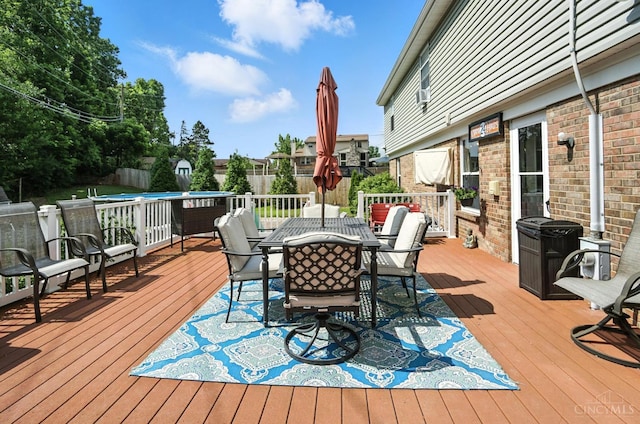4961 Troubador Ct, Delhi Twp, OH 45238 - wooden deck with a fenced backyard and outdoor dining space