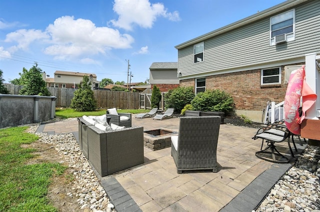 4961 Troubador Ct, Delhi Twp, OH 45238 - view of patio with an outdoor fire pit and cooling unit