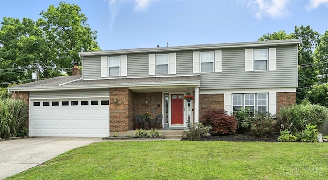 4961 Troubador Ct, Delhi Twp, OH 45238 - view of front of home featuring brick siding, concrete driveway, a front lawn, and a chimney