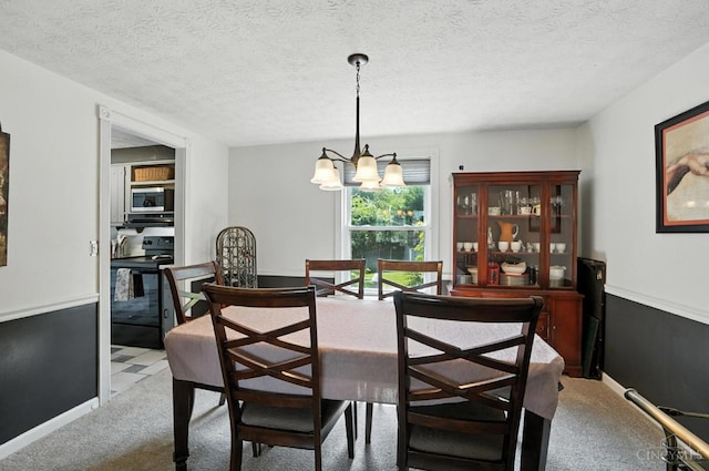 4961 Troubador Ct, Delhi Twp, OH 45238 - dining space featuring light colored carpet, a chandelier, and a textured ceiling