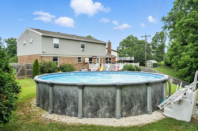 4961 Troubador Ct, Delhi Twp, OH 45238 - view of pool featuring a fenced backyard and a storage shed