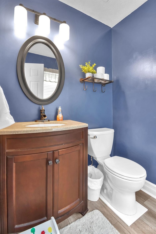 4411 Todd Rose Ct, Union Twp, OH 45244 - half bathroom featuring wood finished floors and vanity