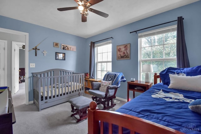 4411 Todd Rose Ct, Union Twp, OH 45244 - carpeted bedroom with ceiling fan and baseboards