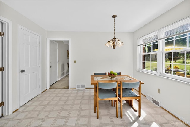 2724 Bentley Ct, Anderson Twp, OH 45244 - dining area featuring a chandelier and light colored carpet