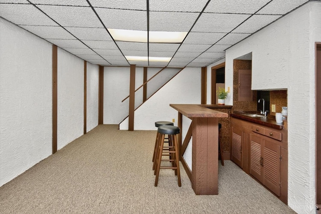 2724 Bentley Ct, Anderson Twp, OH 45244 - indoor bar with a textured wall, light colored carpet, and a drop ceiling