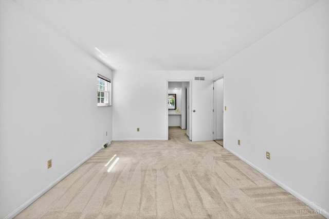 2724 Bentley Ct, Anderson Twp, OH 45244 - unfurnished room featuring light carpet and baseboards