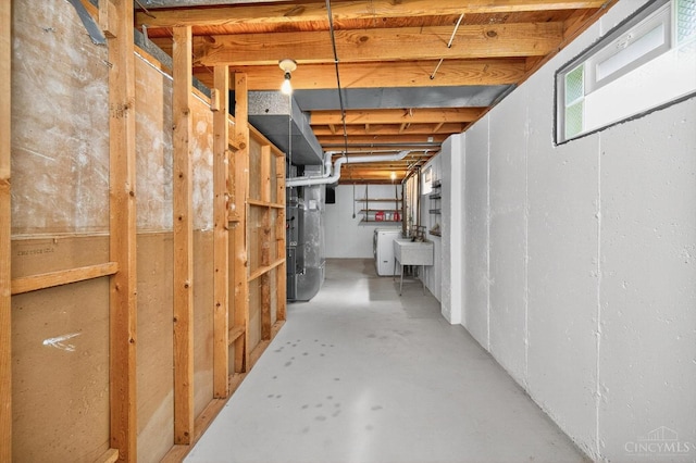 2724 Bentley Ct, Anderson Twp, OH 45244 - basement featuring heating unit and washer / clothes dryer