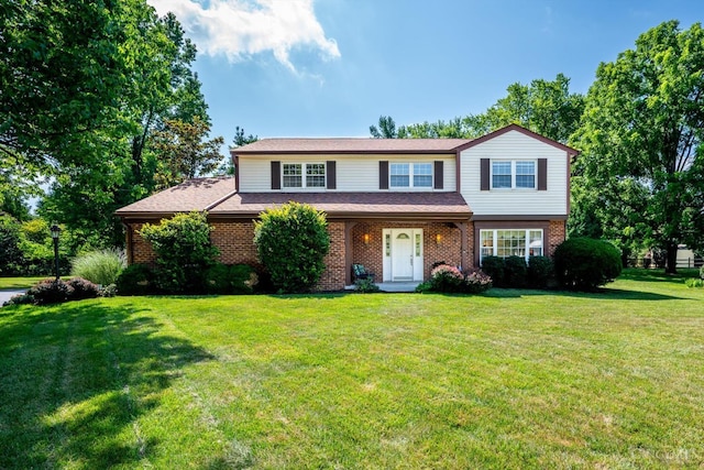 2724 Bentley Ct, Anderson Twp, OH 45244 - traditional-style home featuring brick siding and a front lawn