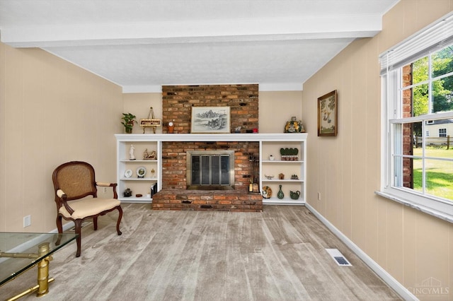 2724 Bentley Ct, Anderson Twp, OH 45244 - living area featuring beam ceiling, wood finished floors, and a brick fireplace