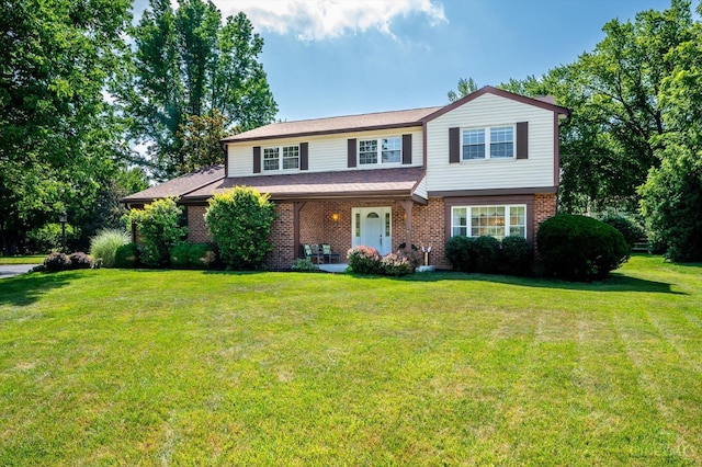 2724 Bentley Ct, Anderson Twp, OH 45244 - traditional-style house with a front lawn and brick siding