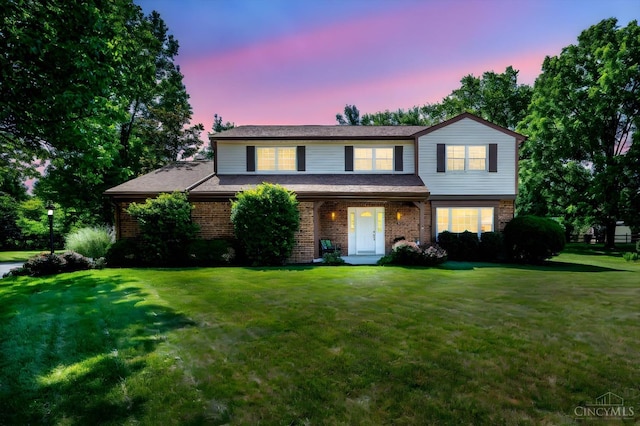 2724 Bentley Ct, Anderson Twp, OH 45244 - traditional-style home with brick siding and a yard