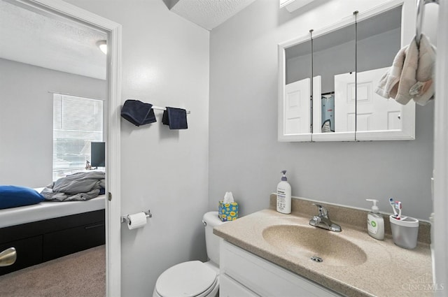 3254 Berwyn Pl, Cincinnati, OH 45209 - full bathroom with vanity, a textured ceiling, and ensuite bath