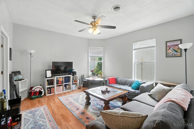 3254 Berwyn Pl, Cincinnati, OH 45209 - living room featuring a ceiling fan, wood finished floors, and a textured ceiling