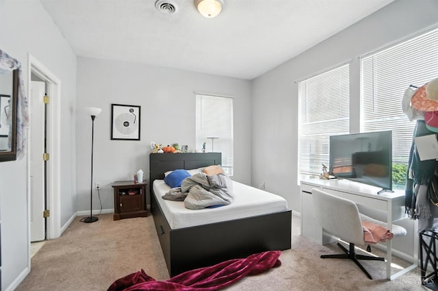 3254 Berwyn Pl, Cincinnati, OH 45209 - bedroom with multiple windows and light carpet