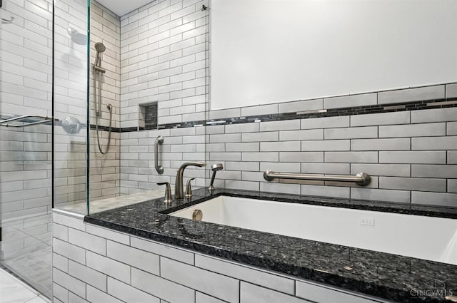 7102 Lookout Ct, Liberty Twp, OH 45011 - full bath featuring a stall shower, a tub to relax in, and tile walls