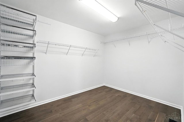 7102 Lookout Ct, Liberty Twp, OH 45011 - spacious closet featuring dark wood-style floors