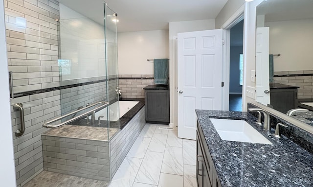 7102 Lookout Ct, Liberty Twp, OH 45011 - bathroom featuring vanity, a shower stall, a garden tub, and marble finish flooring