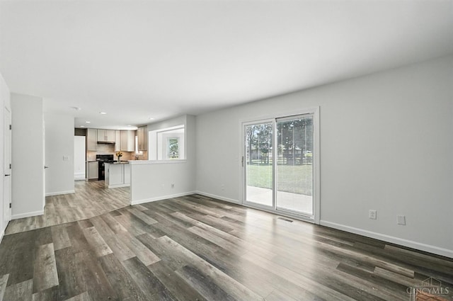 7102 Lookout Ct, Liberty Twp, OH 45011 - unfurnished living room featuring dark wood-style floors and recessed lighting
