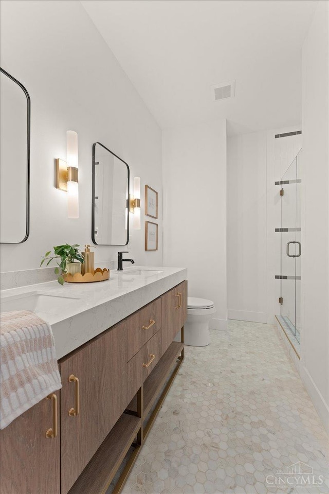 963 Windsor St, Cincinnati, OH 45206 - bathroom with a stall shower and double vanity