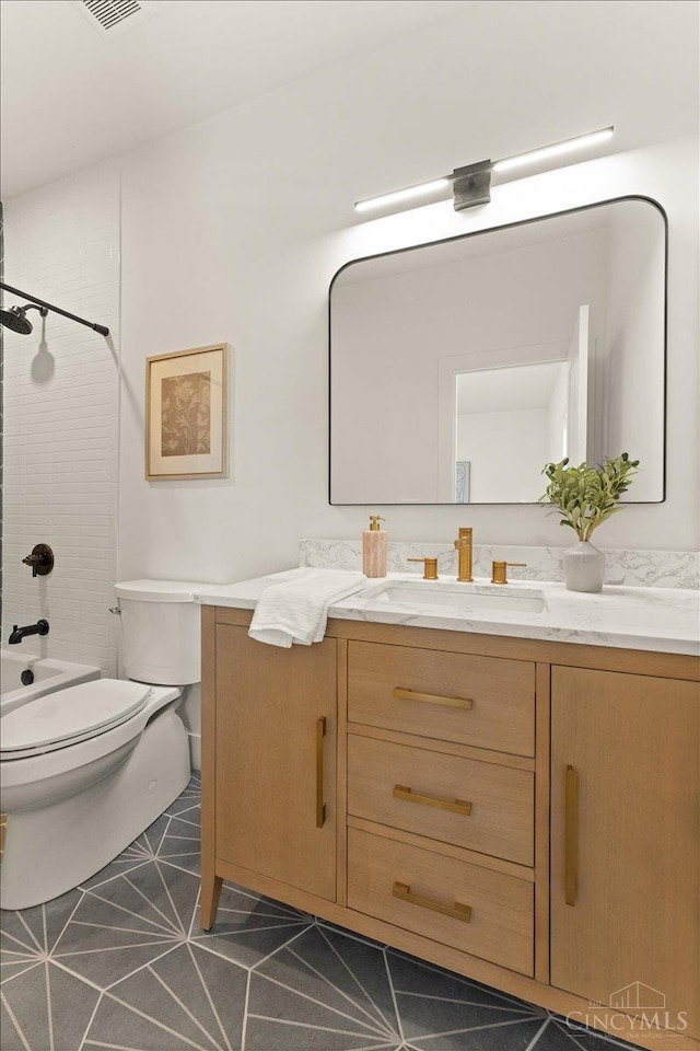 963 Windsor St, Cincinnati, OH 45206 - full bathroom with vanity, tile patterned flooring, and shower / bath combination