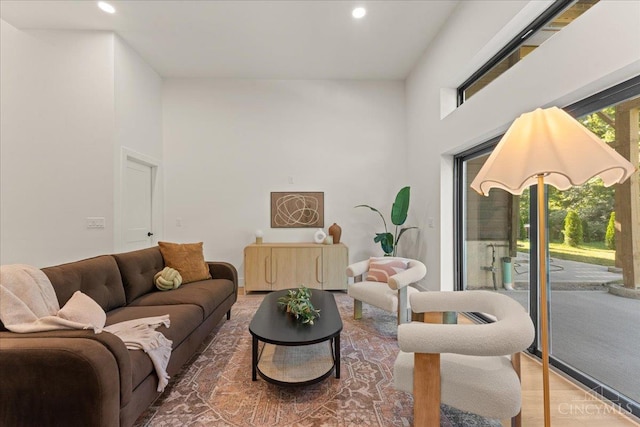 963 Windsor St, Cincinnati, OH 45206 - living room with a high ceiling, recessed lighting, and wood finished floors