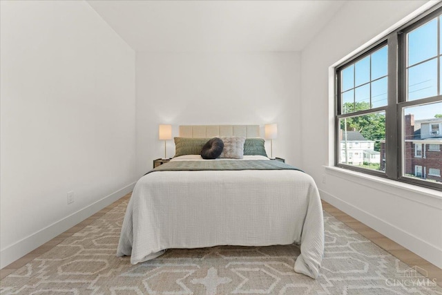 963 Windsor St, Cincinnati, OH 45206 - bedroom with baseboards and wood finished floors