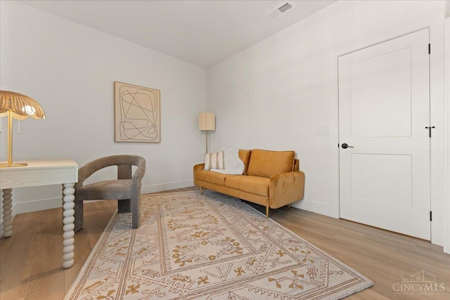 963 Windsor St, Cincinnati, OH 45206 - sitting room with wood finished floors and baseboards
