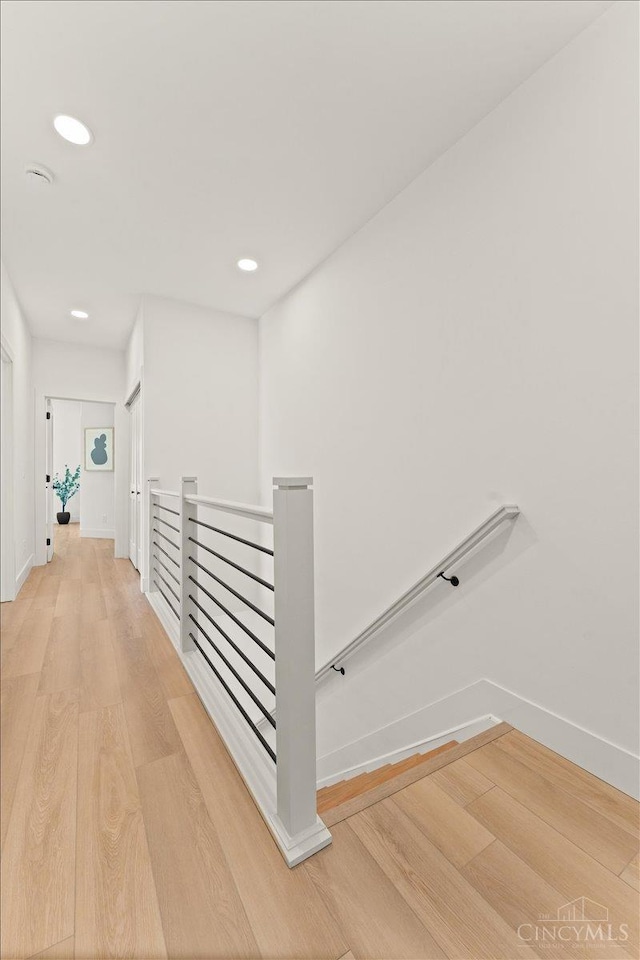 963 Windsor St, Cincinnati, OH 45206 - stairway with wood finished floors and recessed lighting
