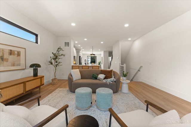 963 Windsor St, Cincinnati, OH 45206 - living room featuring light wood finished floors and recessed lighting