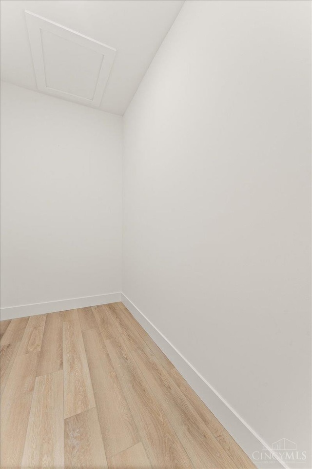 963 Windsor St, Cincinnati, OH 45206 - empty room with light wood-style floors and attic access