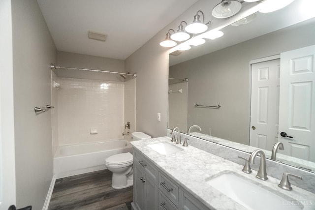 1031 Westchester, Union Twp, OH 45244 - full bathroom featuring wood finished floors, double vanity, and shower / washtub combination