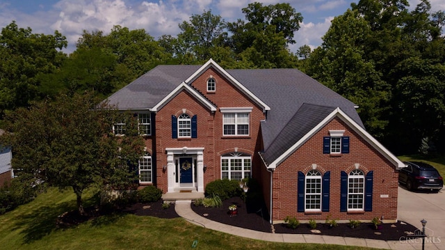 1031 Westchester, Union Twp, OH 45244 - colonial inspired home with brick siding and a front yard