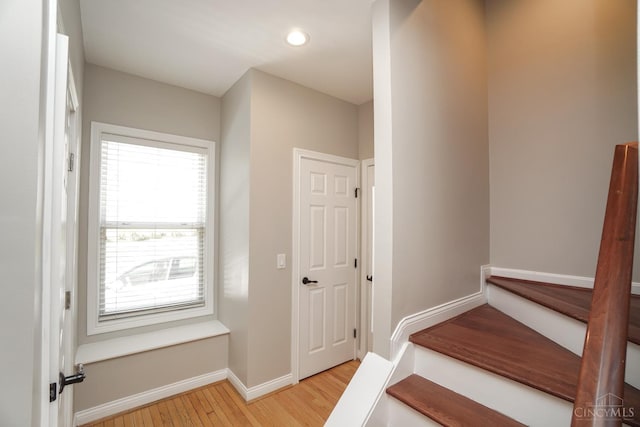 1031 Westchester, Union Twp, OH 45244 - stairs featuring wood finished floors, healthy amount of natural light, and recessed lighting