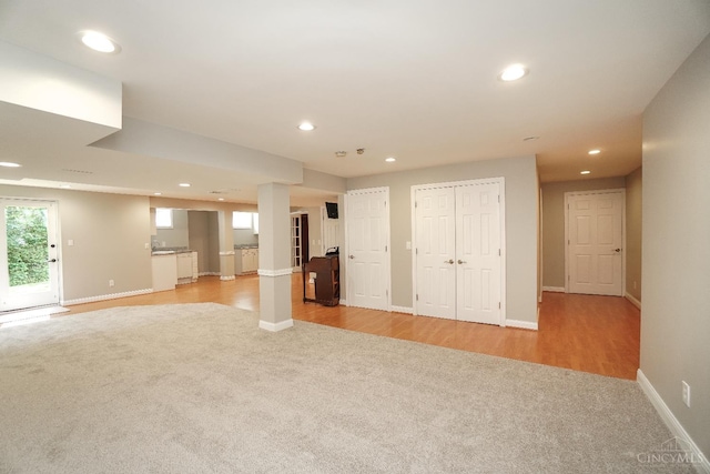 1031 Westchester, Union Twp, OH 45244 - unfurnished living room featuring light carpet and recessed lighting