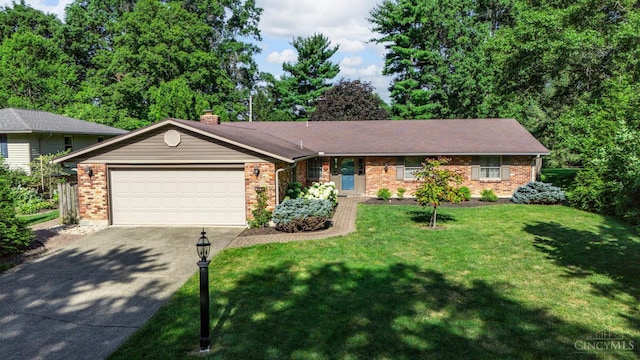 6341 Marshall Rd, Centerville, OH 45459 - single story home with concrete driveway, an attached garage, brick siding, a front lawn, and a chimney