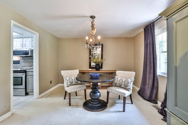 6341 Marshall Rd, Centerville, OH 45459 - dining space with light carpet and a chandelier