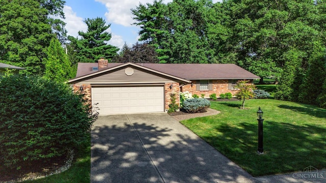 6341 Marshall Rd, Centerville, OH 45459 - ranch-style house with driveway, an attached garage, a front lawn, a chimney, and brick siding