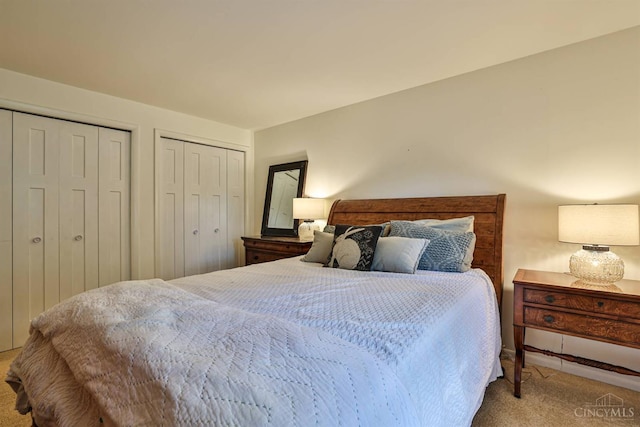 6341 Marshall Rd, Centerville, OH 45459 - carpeted bedroom featuring two closets