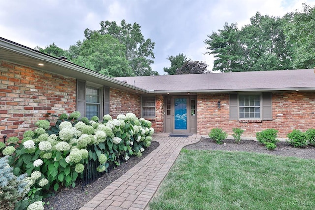 6341 Marshall Rd, Centerville, OH 45459 - entrance to property featuring brick siding, a yard, and roof with shingles